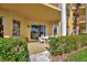 Cozy patio with outdoor seating area, offering a peaceful space to relax and enjoy the views at 4670 Links Village Dr # B102, Ponce Inlet, FL 32127