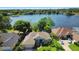 Beautiful aerial view of the community and its lakefront homes on a sunny day at 508 Quail Lake Dr, Debary, FL 32713