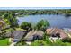Lakefront community aerial view with well-kept homes, lush landscaping, and a serene lake at 508 Quail Lake Dr, Debary, FL 32713