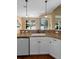 Close-up of the kitchen showcasing a white sink and faucet with granite countertops at 508 Quail Lake Dr, Debary, FL 32713