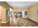Bright and airy living space with hardwood floors and large windows offering outdoor views at 508 Quail Lake Dr, Debary, FL 32713