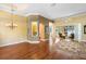 Spacious living area with hardwood floors, recessed lighting, and decorative wall niches at 508 Quail Lake Dr, Debary, FL 32713