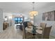 Bright dining area open to the living room, with ocean views at 5207 S Atlantic Ave # 723, New Smyrna Beach, FL 32169