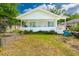 Charming single-story home featuring a welcoming front porch and well-lit exterior at 5261 3Rd St, Orlando, FL 32810
