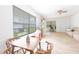 Sunlit living room with neutral tones, perfect for relaxing or entertaining guests at 5261 3Rd St, Orlando, FL 32810