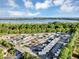 Aerial view of RV and Boat storage with views of Lake Yale and mature trees at 5305 Indian Ocean Loop, Tavares, FL 32778