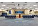 Spacious auditorium with stage, ample seating, and well-lit interior, ideal for community events at 5305 Indian Ocean Loop, Tavares, FL 32778