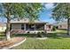 Well-maintained backyard with screened lanai and patio for outdoor relaxation and entertaining at 5305 Indian Ocean Loop, Tavares, FL 32778