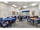 Bright common room with tables and chairs, perfect for gatherings and activities in a home-like setting at 5305 Indian Ocean Loop, Tavares, FL 32778