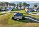 Aerial view of a community gazebo with a picturesque setting and landscaped surroundings at 5305 Indian Ocean Loop, Tavares, FL 32778