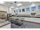 Spacious commercial kitchen with stainless steel appliances, ample cabinetry, and large center island for food preparation at 5305 Indian Ocean Loop, Tavares, FL 32778