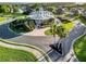 Charming lighthouse feature surrounded by beautifully landscaped gardens in the center of the community at 5305 Indian Ocean Loop, Tavares, FL 32778