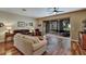 Inviting living room with comfortable seating and view of the outdoors at 5305 Indian Ocean Loop, Tavares, FL 32778