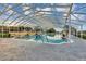 Beautiful indoor pool with crystal clear water and a well-maintained deck, perfect for relaxation and recreation at 5305 Indian Ocean Loop, Tavares, FL 32778