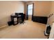 Bedroom with neutral walls and carpet flooring. Perfect for a home office! at 5548 Burlwood Dr, Orlando, FL 32810