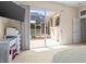 Bedroom view to an outdoor pool area, enhancing relaxation and indoor-outdoor living at 6111 Oxbow Bend Ln, Port Orange, FL 32128