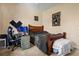 This bedroom features a wooden bed frame and a computer setup, perfect for relaxing and working at 6111 Oxbow Bend Ln, Port Orange, FL 32128