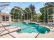 Sparkling pool with a screened enclosure and integrated spa, perfect for relaxation and entertaining at 6111 Oxbow Bend Ln, Port Orange, FL 32128
