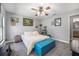 Bedroom with carpet flooring, ceiling fan, and furniture at 6247 Palomino Cir, Port Orange, FL 32127