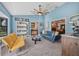 Bright and airy living room with blue walls, modern decor, and a cozy atmosphere at 6247 Palomino Cir, Port Orange, FL 32127