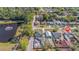 House with a lovely backyard deck and greenhouse near a picturesque pond at 630 Florida Ave, Daytona Beach, FL 32117