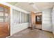 Enclosed sunroom featuring natural light and access to the exterior, ready for customization at 630 Florida Ave, Daytona Beach, FL 32117