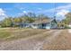 Quaint one-story home with a well-maintained exterior and ample parking at 630 Florida Ave, Daytona Beach, FL 32117