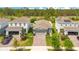 Aerial view of a single Gathering home with well-manicured lawn and landscaping at 7068 Lanier Falls Rd, Deland, FL 32724