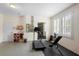 Workout room with fitness equipment and mirrored wall at 716 Riviera Bella Dr, Debary, FL 32713