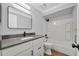 Modern bathroom features a sleek vanity, updated fixtures, and a combined shower and bathtub at 717 S Ridgewood Ave, Ormond Beach, FL 32174