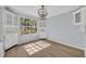 Charming dining room featuring ample natural light and built-in cabinets at 717 S Ridgewood Ave, Ormond Beach, FL 32174