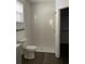 Bathroom showcasing the walk-in shower with white marble style tile at 736 S Stone St, Deland, FL 32720
