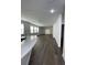 Open-concept living space with hard floors, plenty of natural light, and modern finishes at 736 S Stone St, Deland, FL 32720