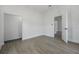 Spacious bedroom with white trim, ample natural light, and wood-look flooring at 742 S Martin Luther King Blvd, Daytona Beach, FL 32114