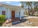 Charming single-story home featuring a cozy front porch and beautifully maintained yard at 742 S Martin Luther King Blvd, Daytona Beach, FL 32114