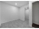 A clean, versatile room with neutral tones and tiled floors is ready for your personal touch at 742 S Martin Luther King Blvd, Daytona Beach, FL 32114