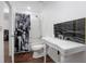 Bathroom features decorative sink, toilet, and a walk-in shower at 792 Bennett Rd, South Daytona, FL 32119