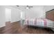 Bedroom featuring wood floors, and neutral paint tones at 792 Bennett Rd, South Daytona, FL 32119