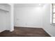 Bedroom with wood floors, neutral paint, and closet space at 792 Bennett Rd, South Daytona, FL 32119