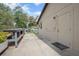 A clean, well-maintained exterior with an entrance door and smooth concrete walkway, great for easy access at 792 Bennett Rd, South Daytona, FL 32119