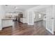 Open kitchen features stainless steel appliances, granite countertops and ample cabinet space at 792 Bennett Rd, South Daytona, FL 32119