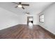 Expansive living room with ceiling fans and hardwood floors perfect for relaxing or entertaining at 792 Bennett Rd, South Daytona, FL 32119