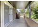 Porch featuring cement floors and view of the yard at 792 Bennett Rd, South Daytona, FL 32119