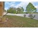Spacious backyard with a white privacy fence at 859 Oak Hollow Loop, Deland, FL 32724