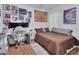 Bedroom featuring a cozy bed, desk setup, and playful decor at 859 Oak Hollow Loop, Deland, FL 32724