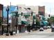 A vibrant street view with colorful buildings and street signs at 859 Oak Hollow Loop, Deland, FL 32724