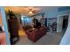 Bright living room featuring neutral paint, ceiling fan, and access to other rooms at 913 Lake Lindley N Dr, Deland, FL 32724