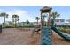 Community playground featuring a slide, climbing area, and swings at 9392 Revere Ave, Leesburg, FL 34788