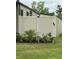 Backyard featuring a privacy fence, landscaped garden beds, and tranquil garden at 130 Oak Tree Dr, Debary, FL 32713