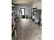 The basement has ample storage shelves, a water heater, and plenty of open floor space at 130 Oak Tree Dr, Debary, FL 32713